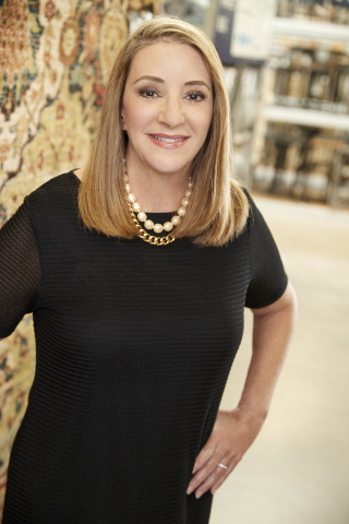 At Home's Mary Jane Broussard receives award for excellence in corporate governance. (Photo: Business Wire)