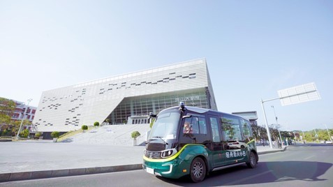 An Ouster lidar sensor on a QCraft robobus (Photo: Business Wire)