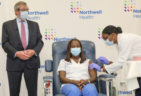 The Smithsonian is getting artifacts from America’s first vaccination. From left: Northwell CEO Michael Dowling, Sandra Lindsay, RN, and vaccinator Michelle Chester, DNP, during the historic moment on December 14, 2020. Credit Northwell Health.