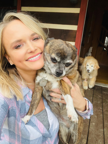 Photo Courtesy of Miranda Lambert Pictured with two of her shelter dogs, Delta and Jessi.