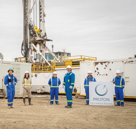 Proton Technologies Canada team members pose in front of the world's first hydrogen well. (Photo: Business Wire)