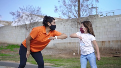 Coaches build near peer mentor relationships with students. (Photo: Business Wire)