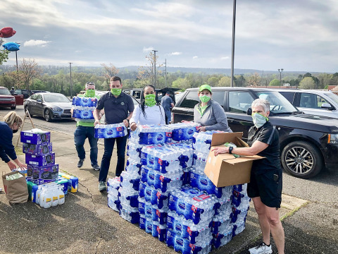 Teams from Regions Bank gathered at Oak Mountain High School near Birmingham, Ala., to deliver food, water and cleaning supplies for people impacted by the tornado outbreak. (Photo: Business Wire)