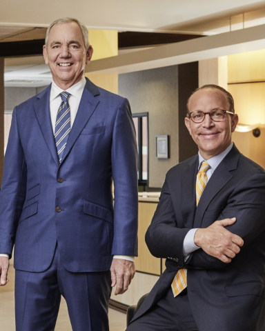 Cintas Corporation CEO and Chairman Scott D. Farmer (left) will retire as CEO on May 31, 2021 after 18 years in the role and 40 years at the company. He will be succeeded as CEO by Todd M. Schneider (right), the company’s current Executive Vice President and Chief Operating Officer, on June 1, 2021. Farmer will remain on as the Executive Chairman of the Board, while Schneider will join the Board as a new Member at that time. (Photo Credit: Courtesy of Cintas Corporation)