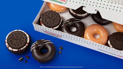 For first time in history, Krispy Kreme partners with another brand to create an all-new glaze and a whole new way to enjoy OREO (Photo: Business Wire)