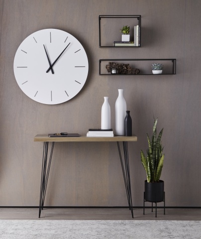 The Loom + Forge™ collection features refined modern indoor decor. Clean lines, bold contrast, and sophisticated style are seen throughout. It includes wall decor, planters, and vases.