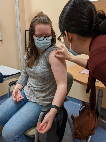 A participant receives a dose marking the start of Phase I trials for Aegis Life/Entos Pharmaceuticals COVID-19 DNA vaccine, Covigenix VAX-001. (Canadian Center for Vaccinology, IWK Health Centre, Nova Scotia).