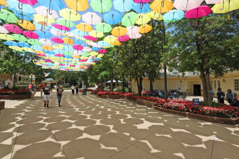 Dollywood guests are greeted by an "Umbrella Sky" as they enter the park during the Flower & Food Festival presented by Covenant Health. This colorful installation has become a favorite photo spot for visitors. (Photo: Business Wire)