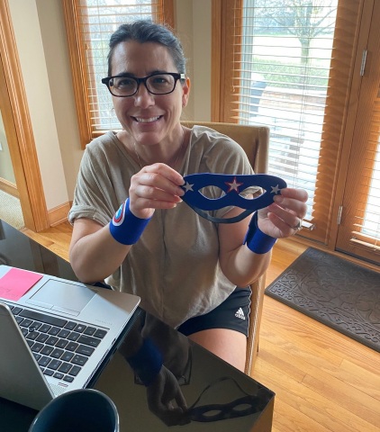 original Michele Ptaszek, ComEd’s manager of customer education and marketing from Naperville, IL, displays one of the superhero masks she created for foster children as part of The Safer at Home Superhero Project for National Volunteer Month. (Photo: Business Wire)