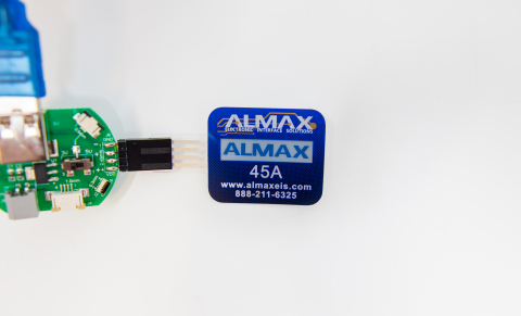 ALMAX has produced 200 production-ready demonstrators integrating Ynvisible electrochromic displays into ALMAX electronics, customized with the ALMAX logo and contact information. (Photo: Business Wire)