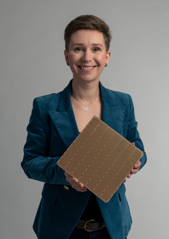 Natalia Vassilieva, Senior Technical Product Manager, Machine Learning at Cerebras Systems, holds the WSE-2. (Photo: Business Wire)