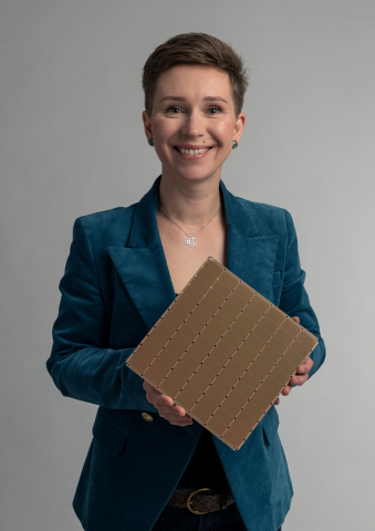 original Natalia Vassilieva, Senior Technical Product Manager, Machine Learning at Cerebras Systems, holds the WSE-2. (Photo: Business Wire)