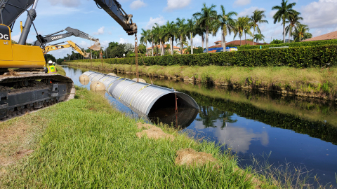 Miami-Dade County and David Mancini & Sons, Inc utilized a HEL-COR® ALT2 solution manufactured by Contech Engineered Solutions to reline an existing culvert. To complete the emergency culvert reline, the liner pipe was installed in a completely submerged condition. (Photo: Business Wire)