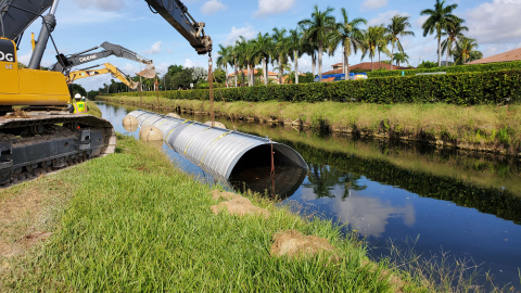 original Miami-Dade County and David Mancini & Sons, Inc utilized a HEL-COR® ALT2 solution manufactured by Contech Engineered Solutions to reline an existing culvert. To complete the emergency culvert reline, the liner pipe was installed in a completely submerged condition. (Photo: Business Wire)