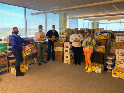 thumbnail NWFCU Foundation and Northwest Federal employees prepare the donations for delivery (Photo: Business Wire)