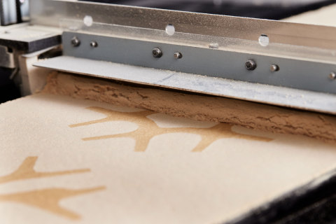 The Forust process combines two waste streams from traditional wood production, sawdust and lignin, to sustainably produce isotropic, high-strength, wood parts. During the printing process, layers of specially treated sawdust are spread and selectively joined by a non-toxic and biodegradable binder. Digital grain is printed on every layer and parts can then be sanded, stained, polished, dyed, coated and refinished in the same manner as traditionally manufactured wood components. (Photo: Business Wire)