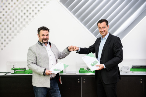 Marcel Huber, founder and managing director of SynCraft and Carlos Lange, president and CEO of INNIO celebrate their companies' collaboration (Photo: Business Wire)