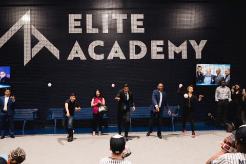 Ceremonial first pitch at Elite Academy grand opening. (Photo: Business Wire)