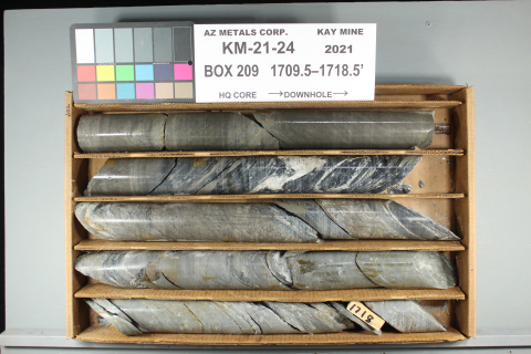 Figure 2. Hole KM-21-24 displaying interval from 520.9 m to 521.7 m downhole, containing 0.8 m of 33.4 g/t AuEq (comprised of 16.5 g/t gold, 574 g/t silver, 1.75% copper, 1.22% lead, and 9.55% zinc). See Table 2 for constituent elements and grades of AuEq g/t. (Photo: Business Wire)