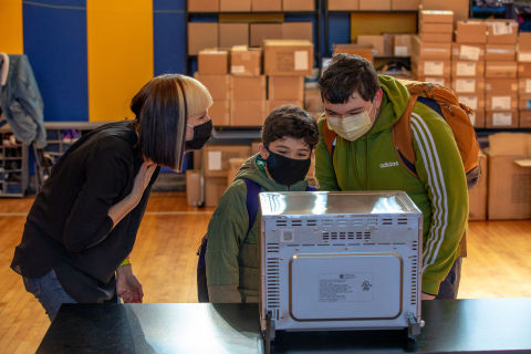 Students receiving instructions from Katie Lowman (Photo: GE Appliances, a Haier company)