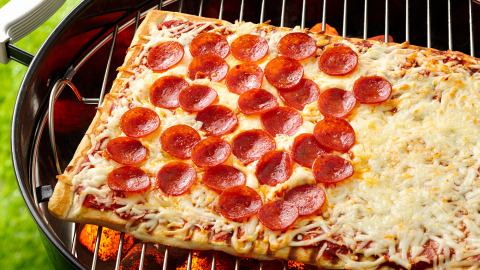 If you’re looking for something to test your creativity on the grill this Memorial Day weekend, try this Grilled Half-and-Half Pizza with Pillsbury™ refrigerated classic pizza crust. (Photo: Business Wire)