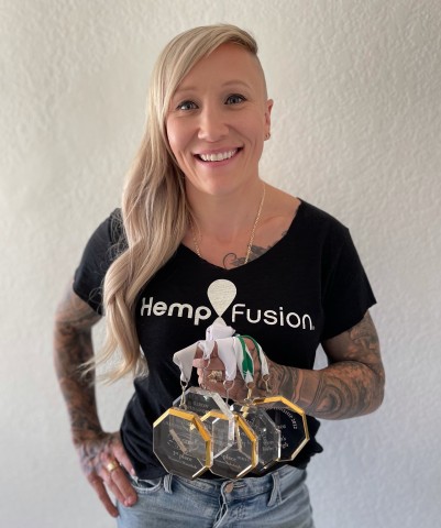 Two-time Olympic Gold Medalist in Bobsled, Kaillie Humphries, holds her five World Championship medals. (Photo: Business Wire)