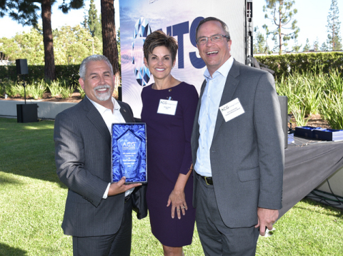 Hector Paez, Chief Operations Officer, and Sarah Willis, Vice President of Marketing, receive the prestigious ACG Innovation Award from ACG Awards Co-Chair Chris Dewhurst on behalf of NTS. (Photo: Business Wire)