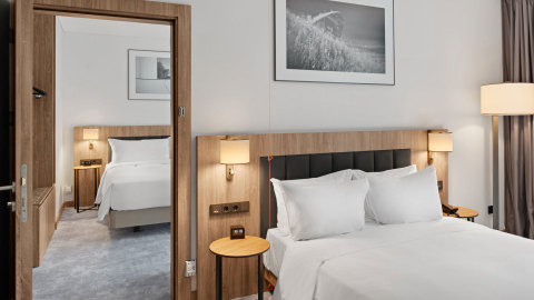 original Hilton solves travel planning frustrations as the first major hotel company to introduce a booking experience that allows individuals to easily book and instantly confirm at least two connecting rooms. (Photo: Business Wire)