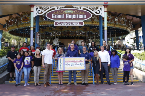 Governor Newsom accepting 50,000 ticket donation from Six Flags President & CEO Mike Spanos along with special guests including some of California's essential workers. (Photo: Business Wire)