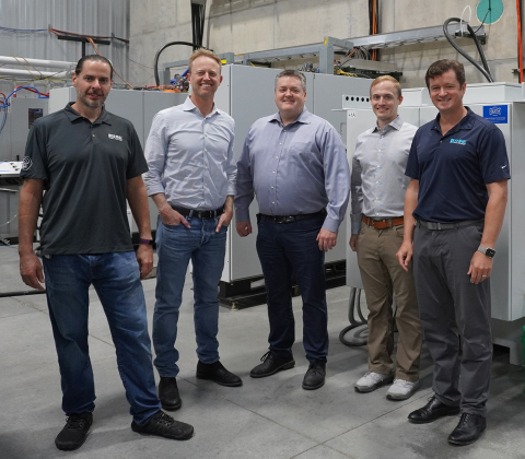 Greg Piefer, SHINE’s Chairman and CEO (left); Chase Koch, President of Koch Disruptive Technologies (KDT); Brett Chugg, Managing Director at KDT; Chris Lee, SHINE’s Chief Financial Officer; and Todd Asmuth, President and Chief Strategy Officer of SHINE, pose for a photo during a tour of SHINE’s Building One, the company's demonstration facility. The $150-million Series C-5 financing SHINE closed recently was led by KDT. (Photo: SHINE Medical Technologies)