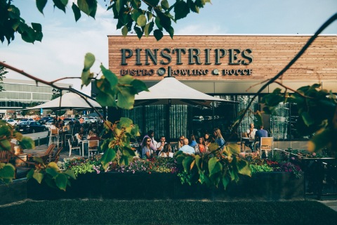 Pinstripe's safe dining and entertainment venues feature beautiful patios, freshly prepared Bistro menus, contactless curbside pickup and expanded delivery. (Photo: Business Wire)