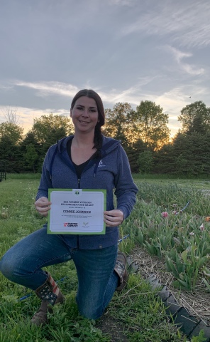 Military veteran and Purple Heart recipient Connie Johnson received a Tractor Supply Company $1,000 grant to support Freedom Acres, her South Dakota-based organic flower company. (Photo: Business Wire)