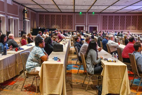 Optometrists participate in a COPE-approved continuing education lecture in Dallas, Texas, with additional ODs tuning in live online. (Photo: Business Wire)