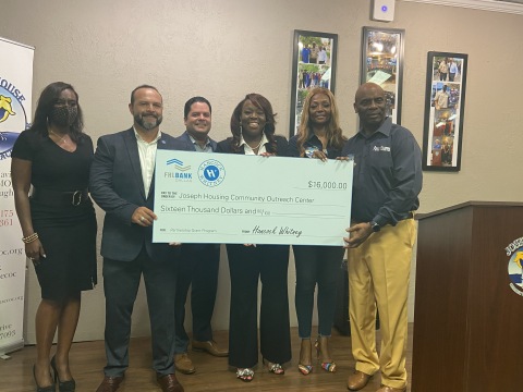 Joseph House received a $16,000 Partnership Grant Program award in Houston. (L to R): Yuroba Harris with Congresswoman Shelia Jackson Lee’s office; Hancock Whitney Bank officials Randall Rojas, Antonio Mojica and LaCarsha Babers; and Joseph House Executive Director Michelle Stearns and Joseph House CEO Robert Stearns at a Houston grant presentation. (Photo: Business Wire)