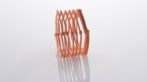 Additional development and testing of Maxxwell Motors' 3D printed copper winding is now underway. Ultimately, Maxxwell’s goal is to binder jet 3D print multiple copper coils as a monolithic piece with ExOne's technology. (Graphic: Business Wire)
