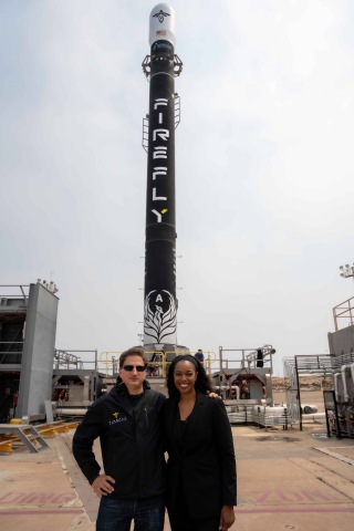 Tom Markusic and Lauren Lyons in front of Firefly Alpha rocket on the pad at Vandenberg Space Force Base (VSFB) (Photo: Business Wire)