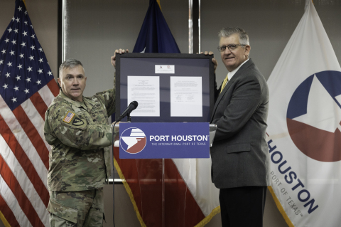 thumbnail Port Houston Executive Director Roger Guenther presents the signed Project Partnership Agreement to U.S. Army Corps of Engineers Galveston District Col. Timothy Vail. (Photo: Business Wire)