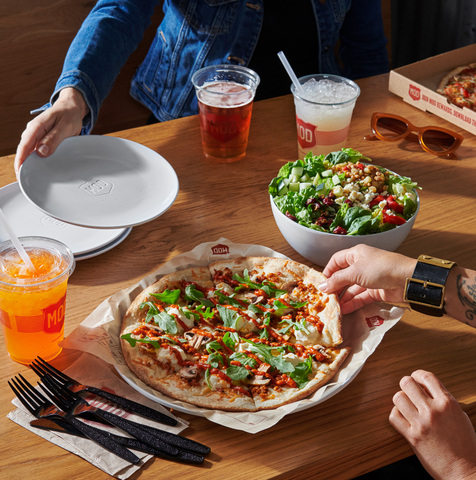 On Plant Your Pizza Day, August 31, customers can try MOD's new plant-based Italian sausage for free with a "Plant One, Get One" offer. (Photo: Business Wire)