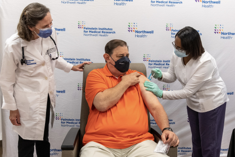 Robert Cass became the first clinical trial participant in New York living with an autoimmune disease to receive his extra COVID-19 vaccine. (Credit: Feinstein Institutes)