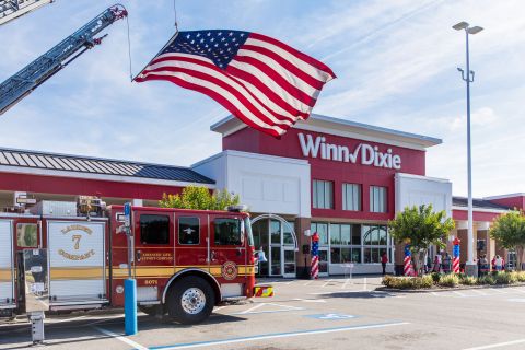 Winn-Dixie's parent company, Southeastern Grocers is honoring the 20th anniversary of 9/11 with a special discount for first responders, such as the Jacksonville Fire and Rescue Department (pictured here), and welcoming local communities to join the grocer in remembrance of the nearly 3,000 people who lost their lives on that tragic day. (Photo: Business Wire)