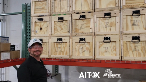 AITX and RAD CEO Steve Reinharz shown with the company's 100th ROSA shipment earlier in the month. (Photo: Business Wire)