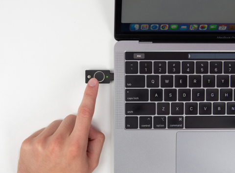 User authenticating on laptop with the YubiKey Bio. (Photo: Business Wire)