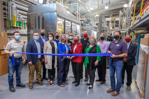 REG President & CEO, CJ Warner, and ISU President, Wendy Wintersteen, prepare to cut the ribbon in celebration of their collaboration on the new hydrotreater pilot plant. Photo courtesy of Christopher Gannon, Iowa State University. (Photo: Business Wire)