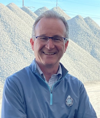 Archie Filshill, CEO and co-founder of Aero Aggregates, stands in front of piles of foamed glass aggregates. The materials are made from 100% post-consumer recycled glass and are used on various resiliency projects to raise the grade on soft compressible soils, add stormwater storage, promote infiltration and reduce carbon footprints. The company will open a new production facility in Modesto in July 2022. (Photo: Business Wire)