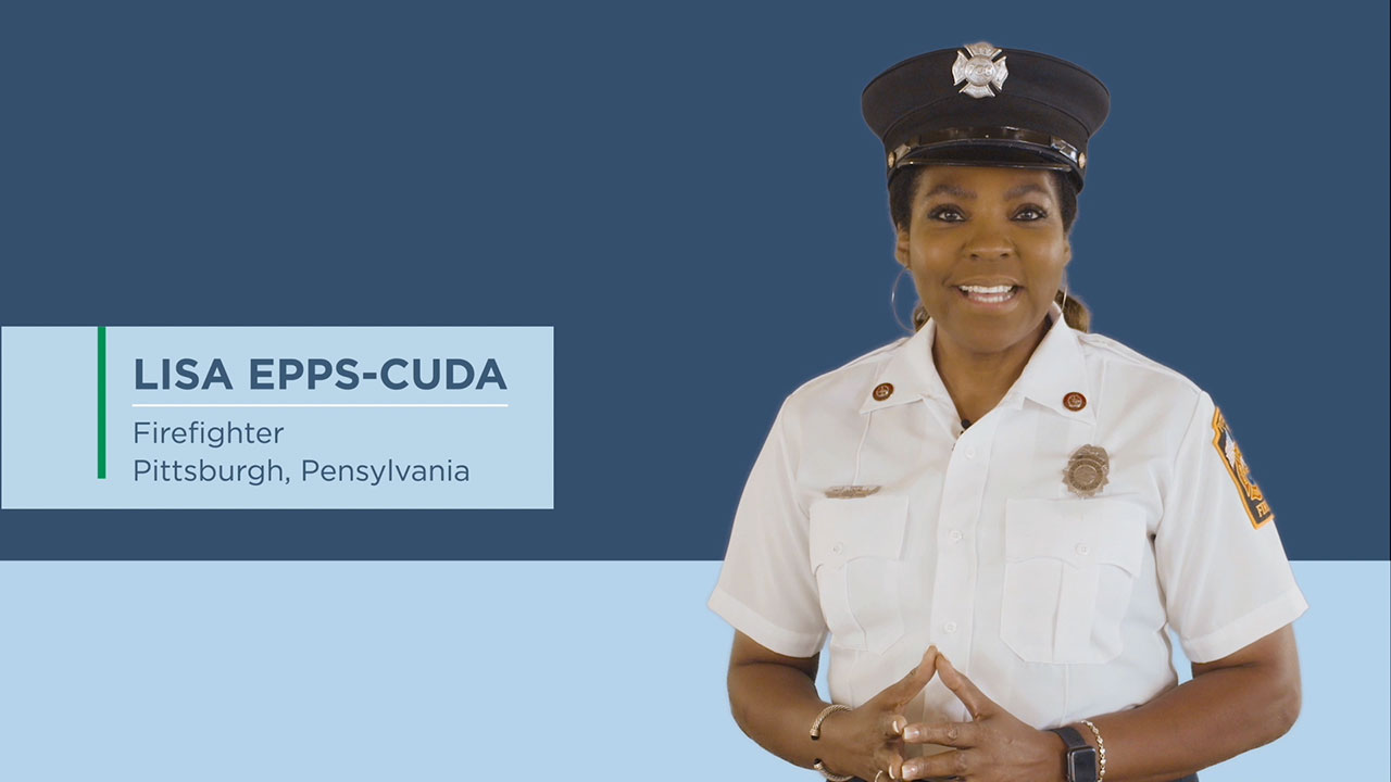 Master Firefighter Lisa Epps-Cuda of the Pittsburgh Bureau of Fire delivers fire safety messages to students during National Junior Fire Marshal Day.