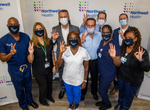 original From left: (Front row) Yves Duroseau, MD; Elyse Isopo, RN; Sandra Lindsay, RN; Michelle Chester, DNP; and Marie Lebrun, RN; (Back row) David Battinelli, MD; Richard Schwarz, MD; Andrew Adesman, MD; and Michael Goldberg, Exec. Director, LIJ Medical Center. Credit: Northwell Health