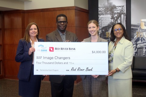 original From left: Jennifer Elliott, Red River Bank; Damon Humphrey, Image Changers; Jill Drodge, Federal Home Loan Bank of Dallas; and Judy Madison, Red River Bank; celebrate a $4,000 grant award to Image Changers of Shreveport, Louisiana. (Photo: Business Wire)