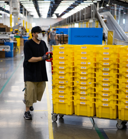 Team member in an Amazon facility (Photo: Business Wire)