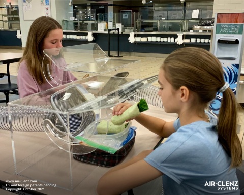 The Air-Clenz system can be used in cafeterias, where mask wearing will be limited, to capture exhaled breaths quickly, limiting the spread of COVID-19 and other viral infections. (Photo: Business Wire)