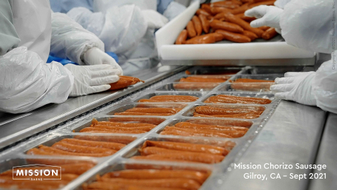 Silva Sausage employees pack Mission Barns Chorizo Sausages in the first production run of a multi-year partnership between the two companies. The sausages pictured are a delicious blend of Mission Fat and plant-protein.